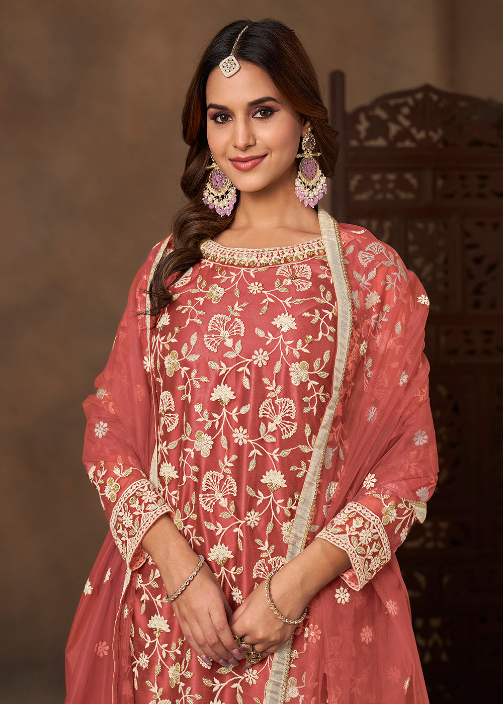 Shop Now Net Peach Wedding Embroidered Gharara Style Suit Online at Empress in USA, UK, Canada, Germany, Australia, Sweden, Denmark, UAE, Qatar & Worldwide.