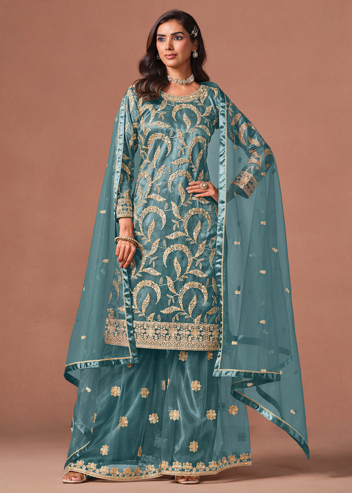 Shop Now Blue Net Beautifully Embroidered Wedding Party Sharara Suit Online at Empress in US, UK, Canada, Italy, Germany, France, Greece, Sweden, Denmark &amp; Worldwide.