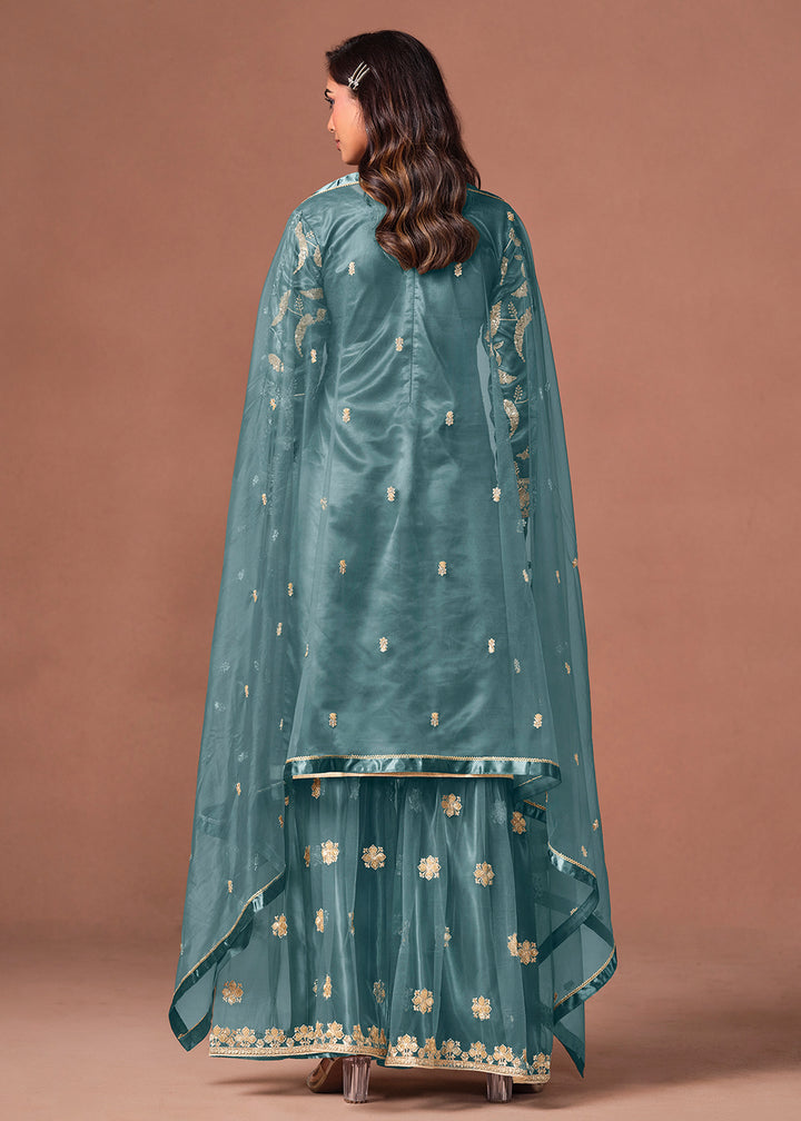 Shop Now Blue Net Beautifully Embroidered Wedding Party Sharara Suit Online at Empress in US, UK, Canada, Italy, Germany, France, Greece, Sweden, Denmark &amp; Worldwide.
