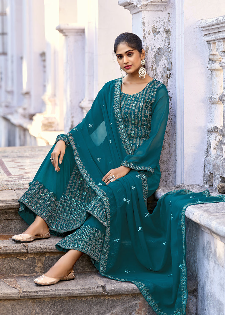Buy Now Thread & Sequins Embroidered Teal Palazzo Salwar Suit Online in USA, UK, Canada, Germany, Australia & Worldwide at Empress Clothing.