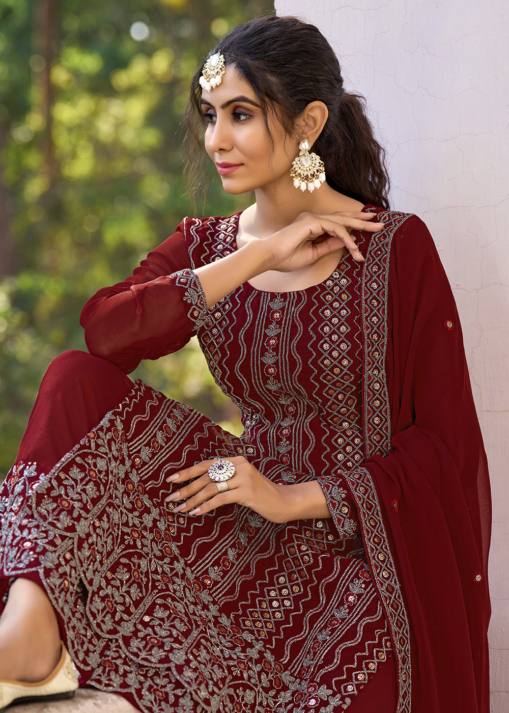 Buy Now Thread & Sequins Embroidered Maroon Palazzo Salwar Suit Online in USA, UK, Canada, Germany, Australia & Worldwide at Empress Clothing. 