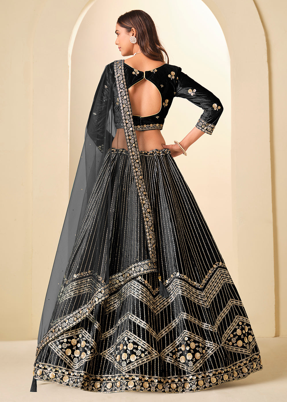 Buy NowBlack Velvet Beutifully Embroidered Lehenga Choli Online in US, UK, Canada, France, Germany, Sweden, Greece, Denmark, Spain, UAE & Worldwide at Empress.
