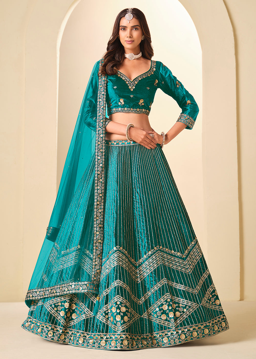 Buy Now Firozi Velvet Beutifully Embroidered Lehenga Choli Online in US, UK, Canada, France, Germany, Sweden, Greece, Denmark, Spain, UAE & Worldwide at Empress