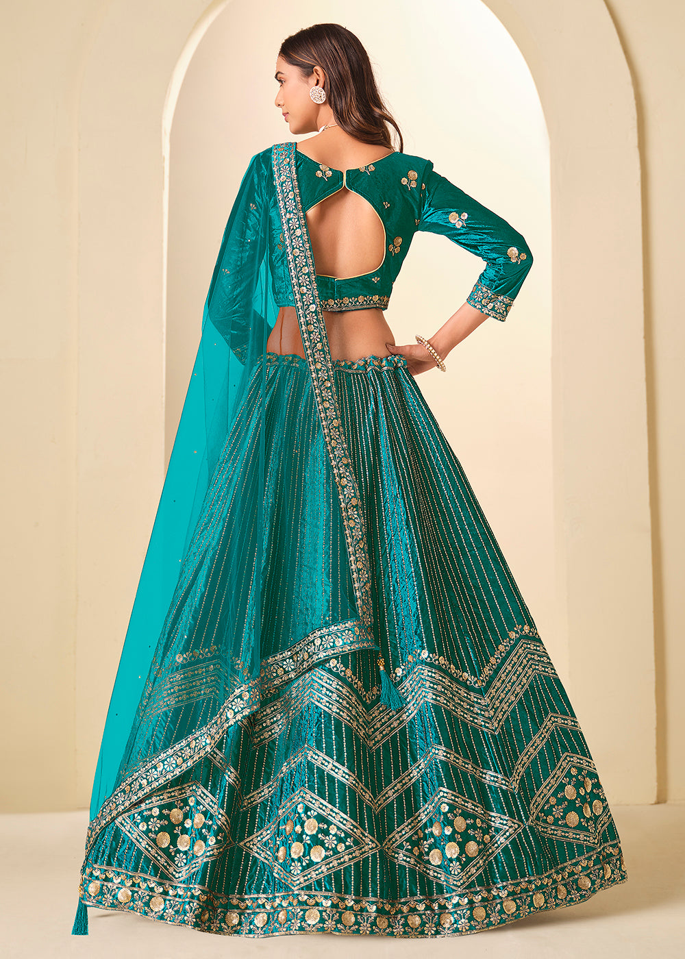 Buy Now Firozi Velvet Beutifully Embroidered Lehenga Choli Online in US, UK, Canada, France, Germany, Sweden, Greece, Denmark, Spain, UAE & Worldwide at Empress