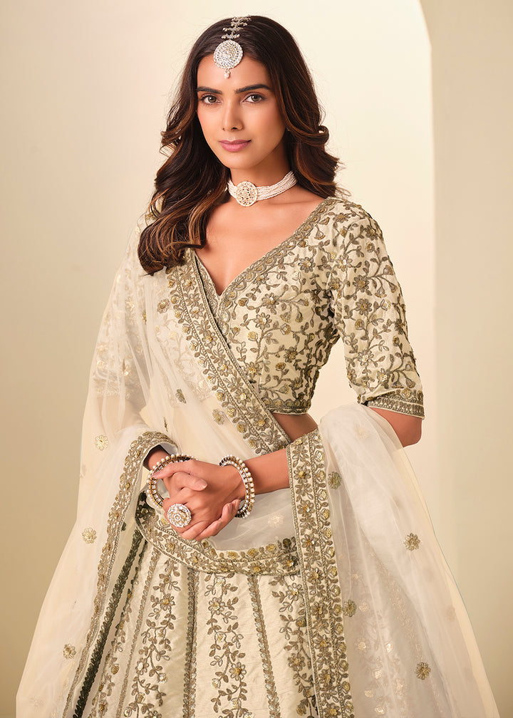 Buy Now Cream Gold Embroidered Art Silk Wedding Lehenga Choli Online in USA, UK, France, Swiss, Netherlands, Germany, Italy, Qatar, UAE & Worldwide at Empress.