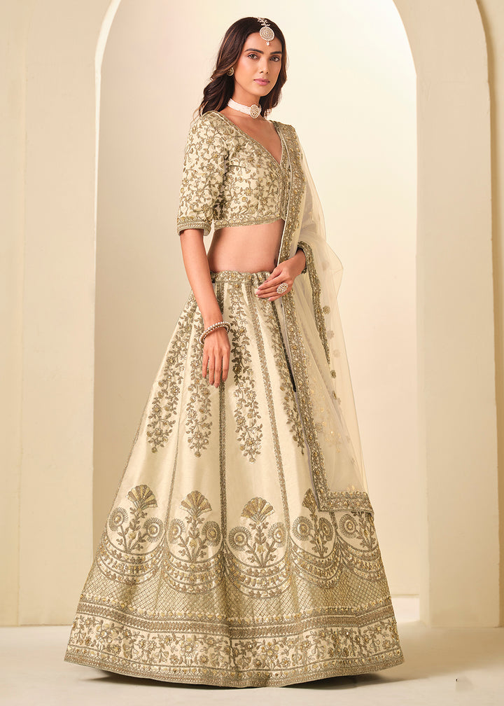 Buy Now Cream Gold Embroidered Art Silk Wedding Lehenga Choli Online in USA, UK, France, Swiss, Netherlands, Germany, Italy, Qatar, UAE & Worldwide at Empress.