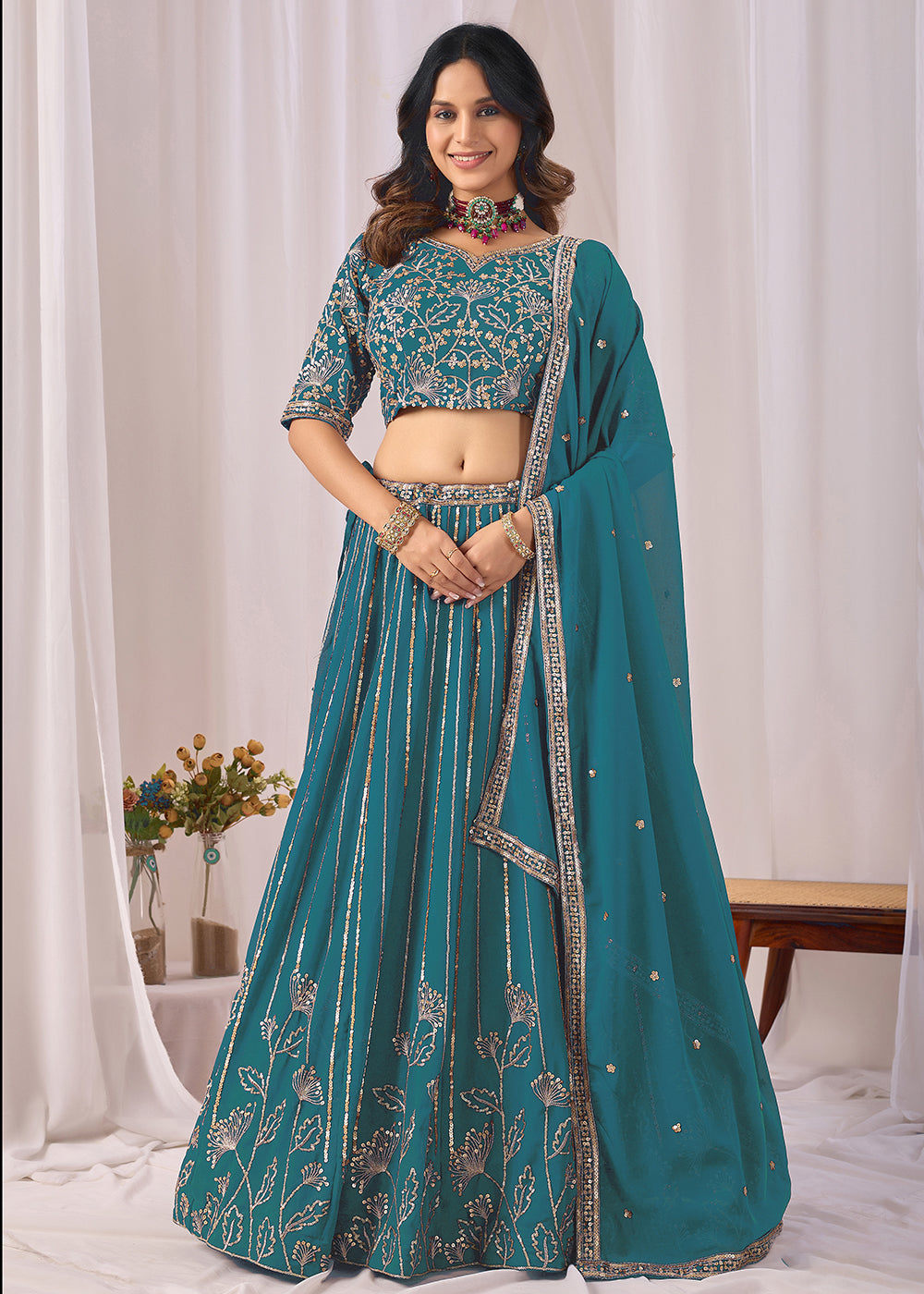Buy Now Turquoise Faux Georgette Designer Style Lehenga Choli Online in US, UK, Canada, France, Italy, Greece, Sweden, Netherlands, UAE & Worldwide at Empress.