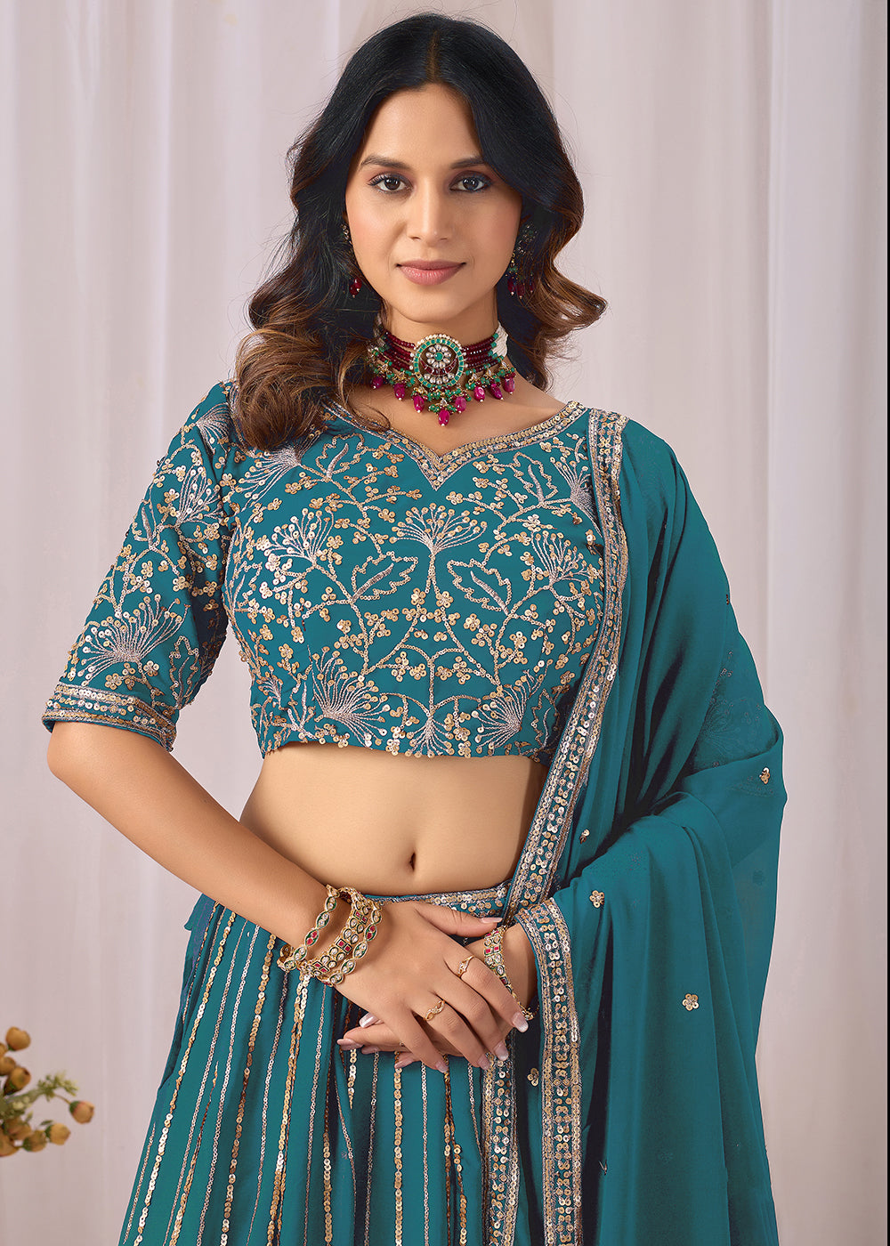 Buy Now Turquoise Faux Georgette Designer Style Lehenga Choli Online in US, UK, Canada, France, Italy, Greece, Sweden, Netherlands, UAE & Worldwide at Empress.