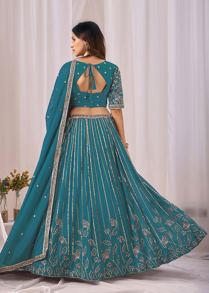 Buy Now Turquoise Faux Georgette Designer Style Lehenga Choli Online in US, UK, Canada, France, Italy, Greece, Sweden, Netherlands, UAE &amp; Worldwide at Empress.