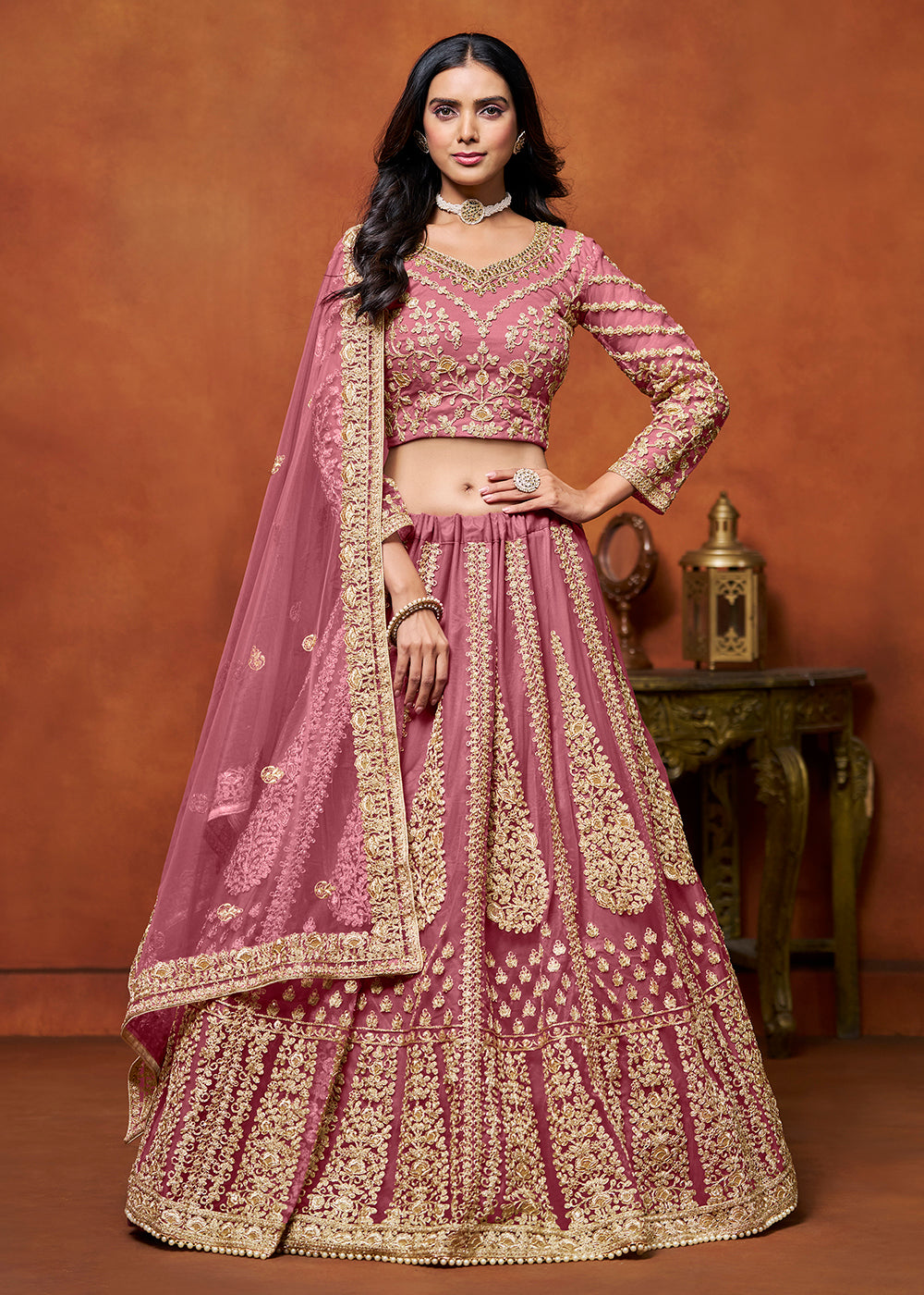 Buy Now Puce Pink Net Embroidered Festive Lehenga Choli Online in USA, UK, Canada, UAE & Worldwide at Empress Clothing.