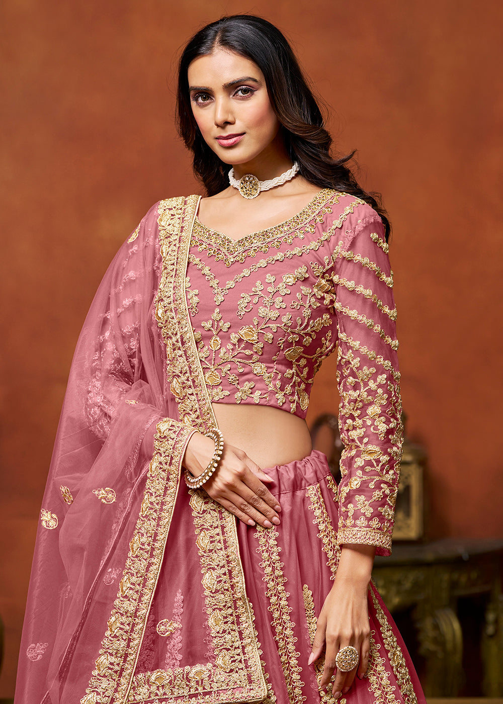 Buy Now Puce Pink Net Embroidered Festive Lehenga Choli Online in USA, UK, Canada, UAE & Worldwide at Empress Clothing.