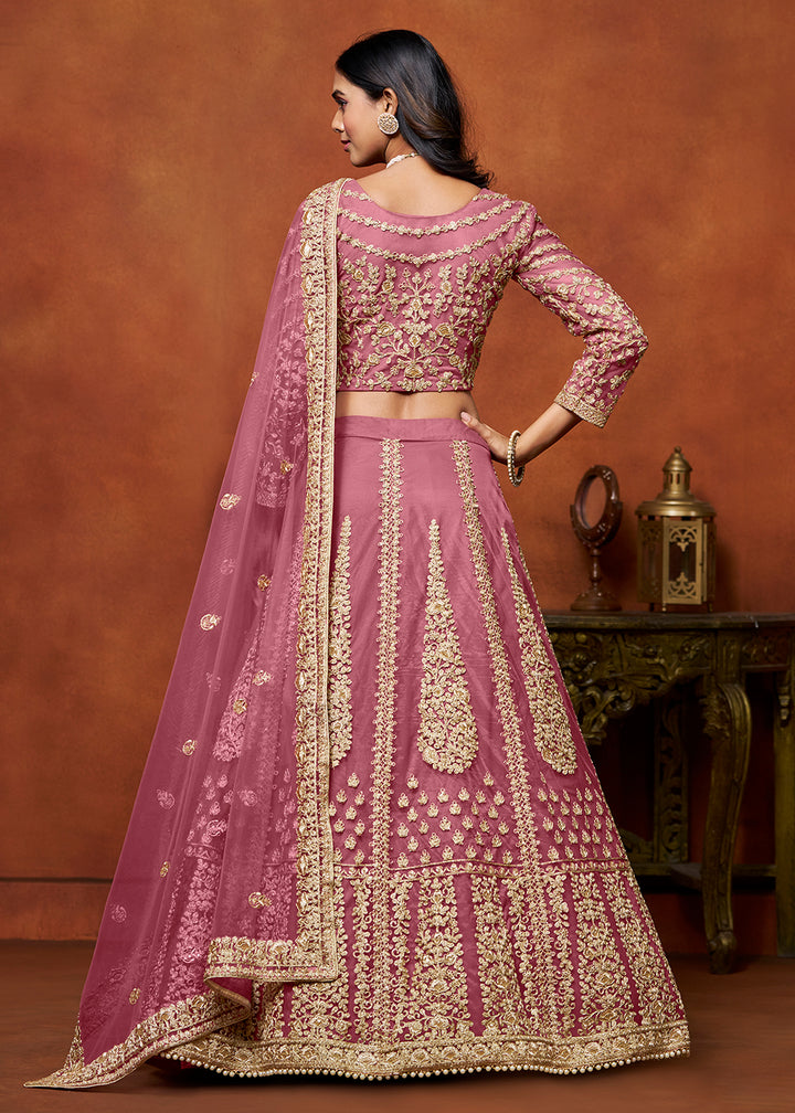 Buy Now Puce Pink Net Embroidered Festive Lehenga Choli Online in USA, UK, Canada, UAE & Worldwide at Empress Clothing.