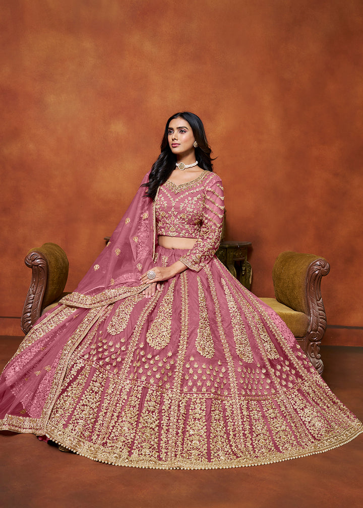 Buy Now Puce Pink Net Embroidered Festive Lehenga Choli Online in USA, UK, Canada, UAE & Worldwide at Empress Clothing.