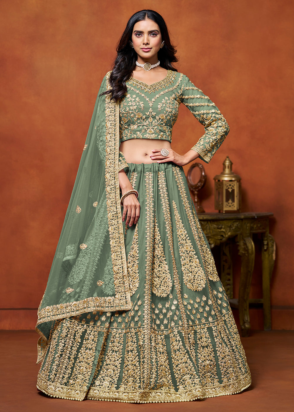 Buy Now Sage Green Net Embroidered Festive Lehenga Choli Online in USA, UK, Canada, UAE & Worldwide at Empress Clothing.