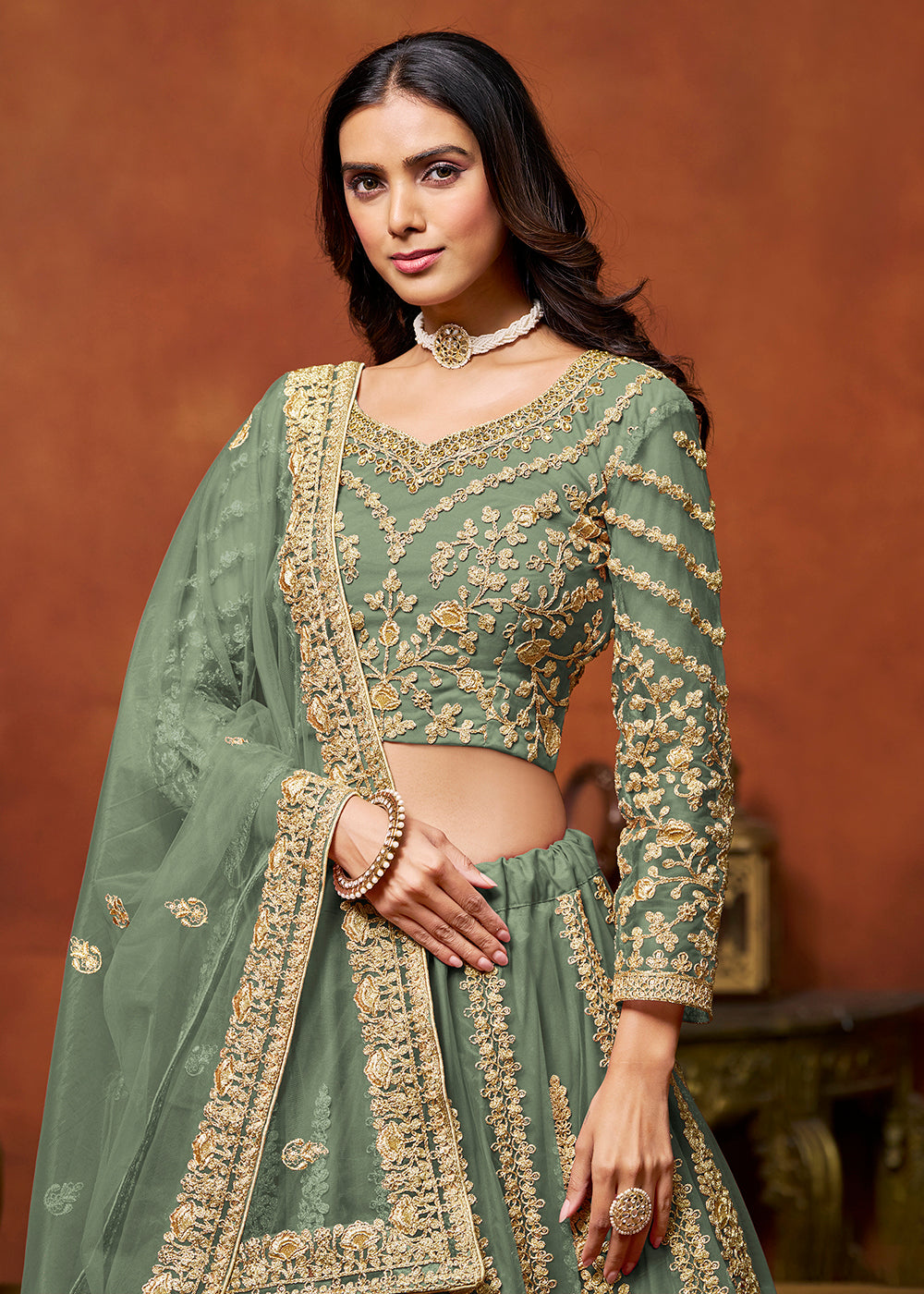 Buy Now Sage Green Net Embroidered Festive Lehenga Choli Online in USA, UK, Canada, UAE & Worldwide at Empress Clothing.