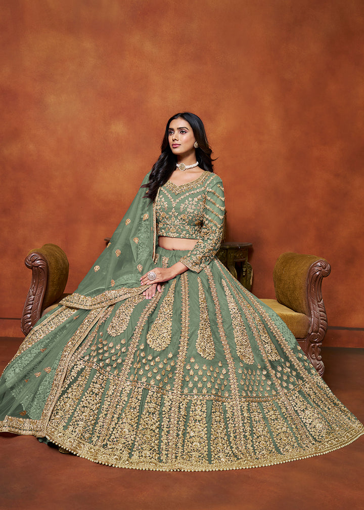 Buy Now Sage Green Net Embroidered Festive Lehenga Choli Online in USA, UK, Canada, UAE & Worldwide at Empress Clothing.