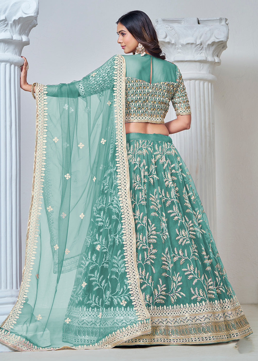 Buy Now Turquoise Net Embroidered Wedding Festive Lehenga Choli Online in USA, UK, Canada, South Africa & Worldwide at Empress Clothing. 