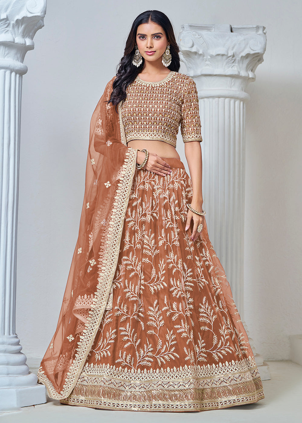 Buy Now Brown Net Embroidered Wedding Festive Lehenga Choli Online in USA, UK, Canada, UAE & Worldwide at Empress Clothing.