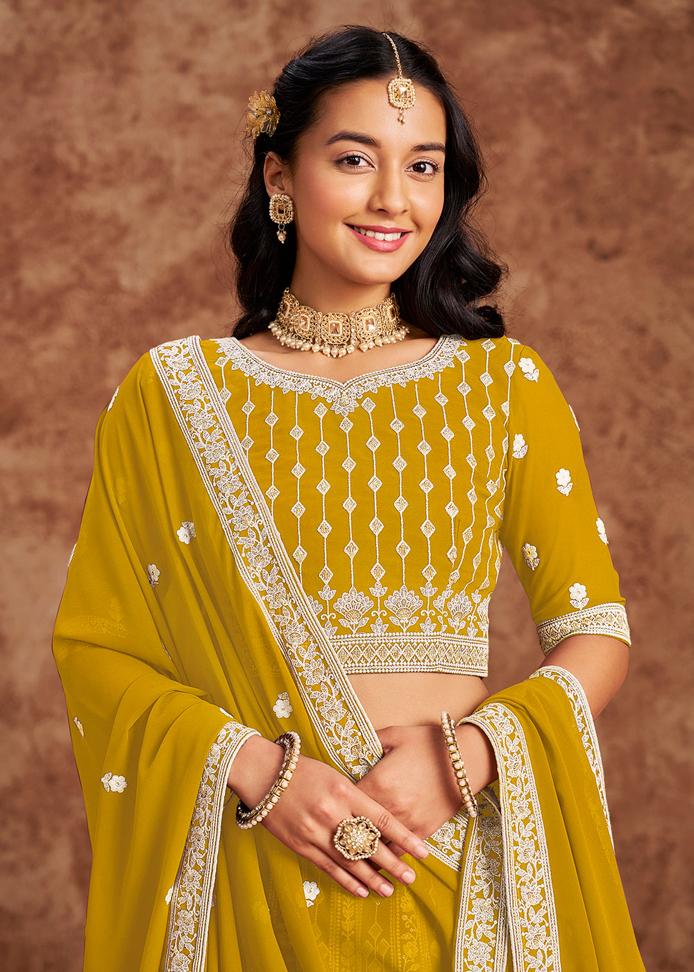 Buy Now Faux Georgette Yellow Color Embroidered Lehenga Choli Online in USA, UK, Canada, UAE & Worldwide at Empress Clothing. 