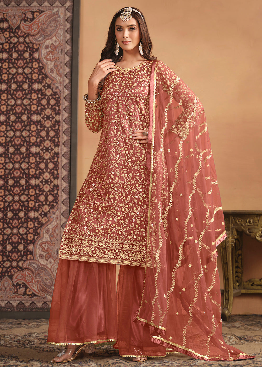 Shop Now Net Rust Orange Embroidered Gharara Style Suit Online at Empress Clothing in USA, UK, Canada, Italy & Worldwide.