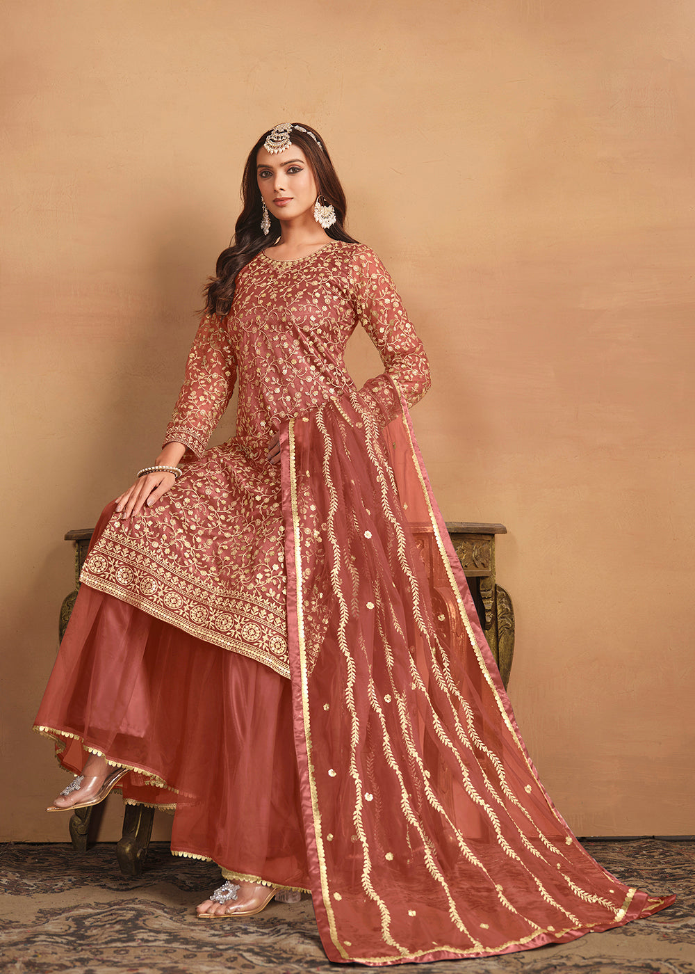 Shop Now Net Rust Orange Embroidered Gharara Style Suit Online at Empress Clothing in USA, UK, Canada, Italy & Worldwide.
