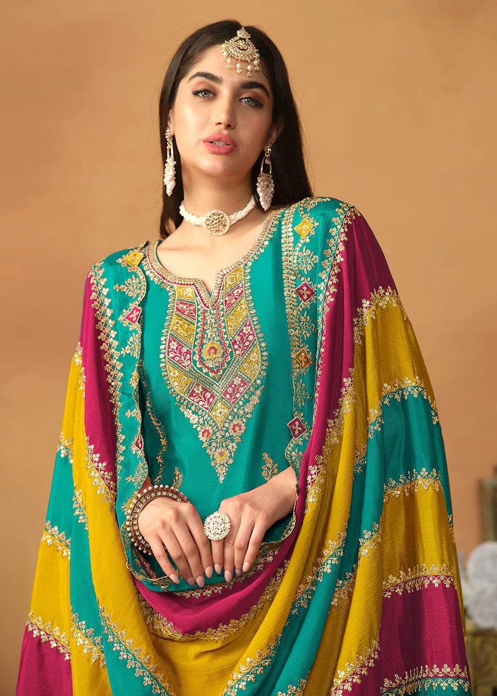 Buy Now Chinnon Silk Turquoise Salwar Suit with Multicolor Dupatta Online in USA, UK, Canada, Germany, Australia & Worldwide at Empress Clothing. 