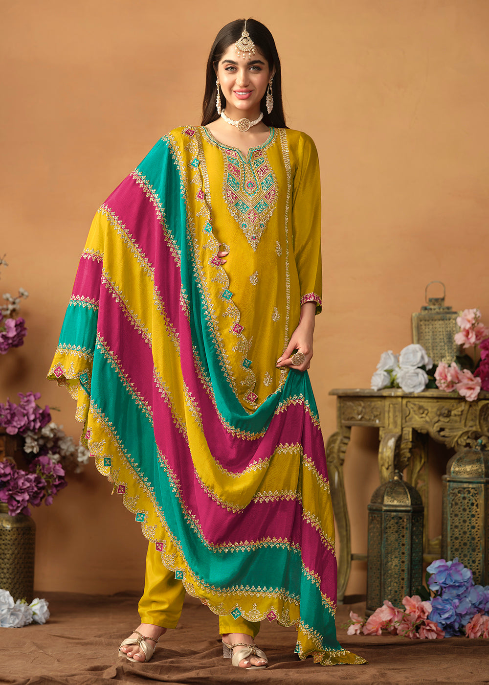 Buy Now Chinnon Silk Yellow Salwar Suit with Multicolor Dupatta Online in USA, UK, Canada, Germany, Australia & Worldwide at Empress Clothing. 