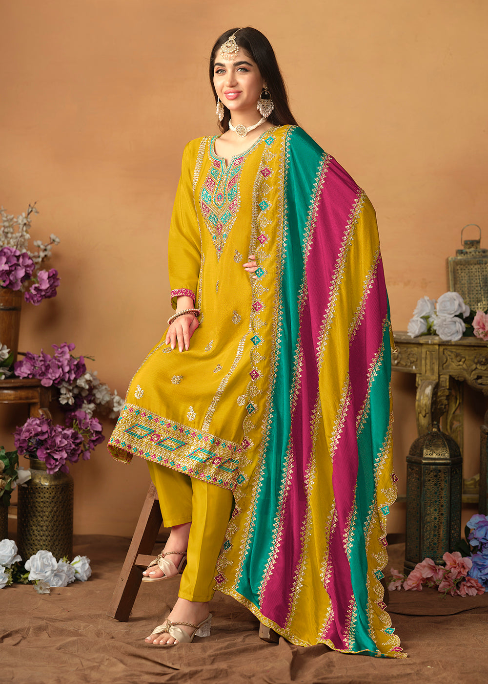 Buy Now Chinnon Silk Yellow Salwar Suit with Multicolor Dupatta Online in USA, UK, Canada, Germany, Australia & Worldwide at Empress Clothing. 