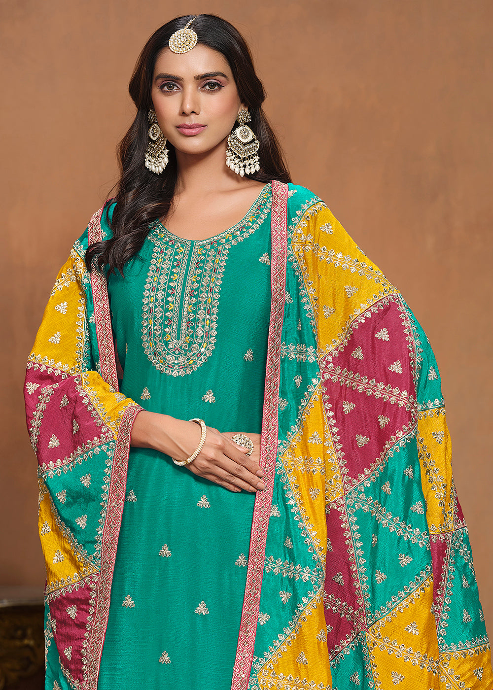 Buy Now Chinnon Silk Turquoise Salwar Suit with Triangular Patch Dupatta Online in USA, UK, Canada, Germany & Worldwide at Empress Clothing. 