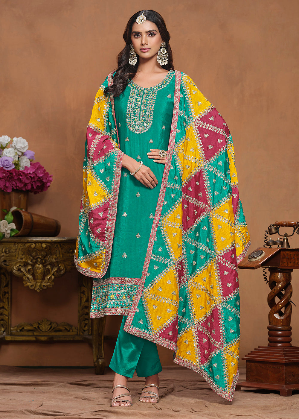 Buy Now Chinnon Silk Turquoise Salwar Suit with Triangular Patch Dupatta Online in USA, UK, Canada, Germany & Worldwide at Empress Clothing. 