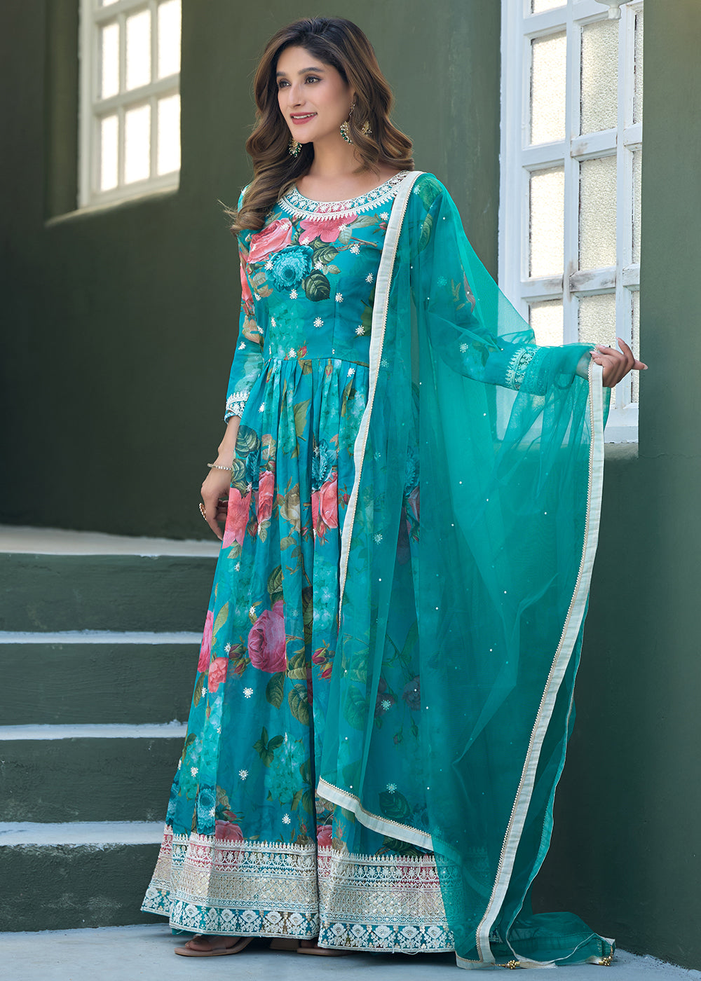 Buy Now Aqua Blue Tabby Silk Sequins Anarkali Gown Online in US, UK, Canada, France, Italy, Sweden, Ireland, UAE, Denmark, Greece, UAE & Worldwide at Empress.