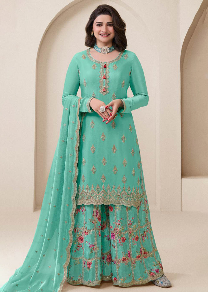 Buy Now Turquoise Festive Style Embroidered Chinnon Palazzo Suit Online in USA, UK, Canada, Germany, Italy, France, Australia & Worldwide at Empress Clothing.