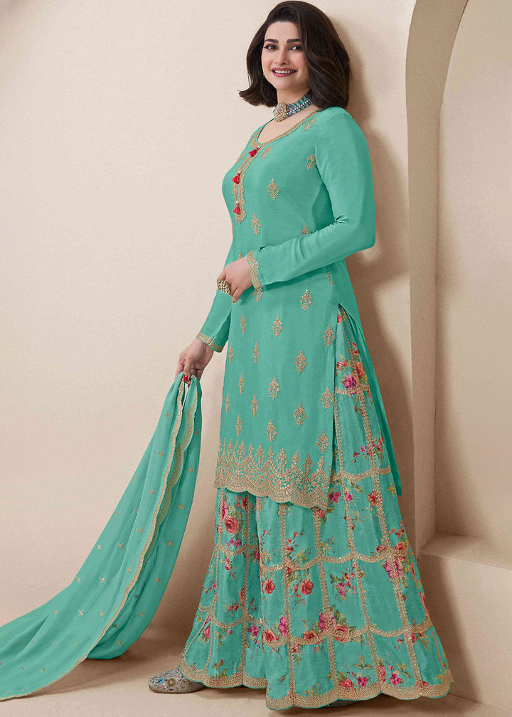 Buy Now Turquoise Festive Style Embroidered Chinnon Palazzo Suit Online in USA, UK, Canada, Germany, Italy, France, Australia & Worldwide at Empress Clothing.