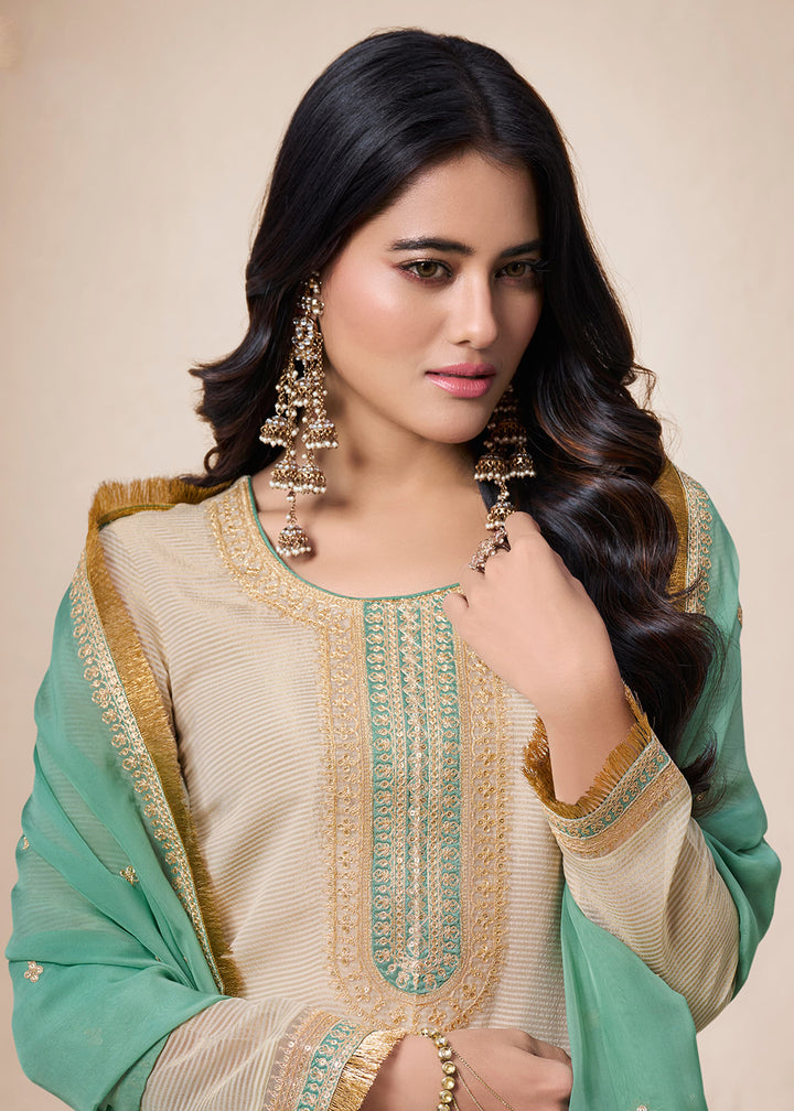 Buy Now Beige & Green Viscose Organza Embroidered Salwar Suit Online in USA, UK, Canada, Germany, Australia & Worldwide at Empress Clothing.