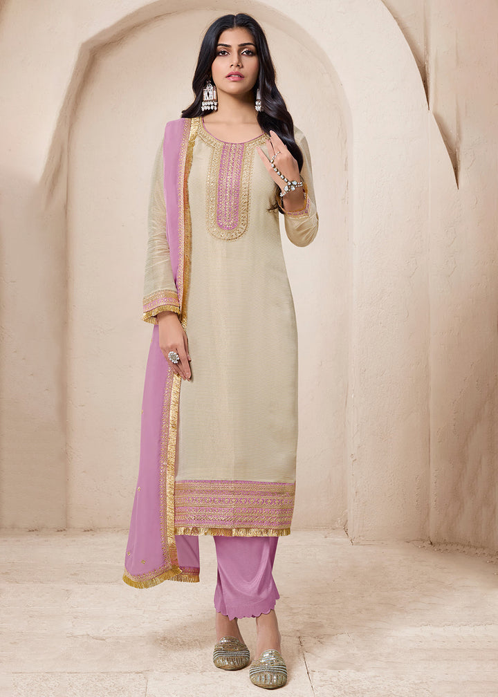 Buy Now Beige & Purple Viscose Organza Embroidered Salwar Suit Online in USA, UK, Canada, Germany, Australia & Worldwide at Empress Clothing. 