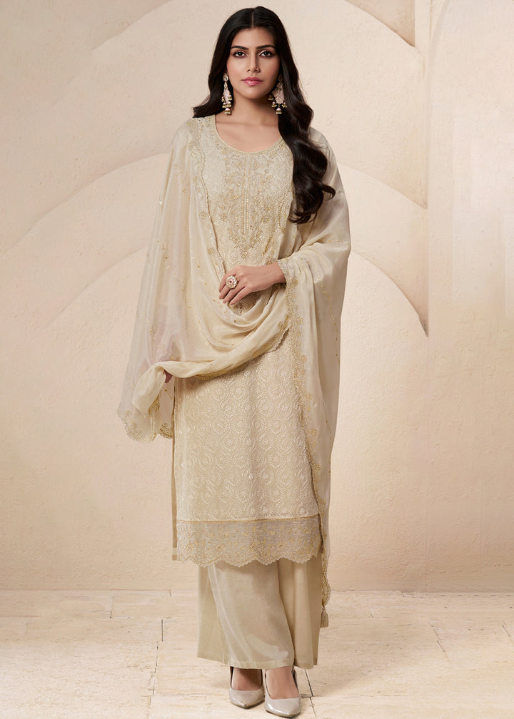 Buy Now Off White Schiffli Embroidered Organza Palazzo Salwar Suit Online in USA, UK, Canada, Germany, Italy, France, Austria & Worldwide at Empress Clothing.
