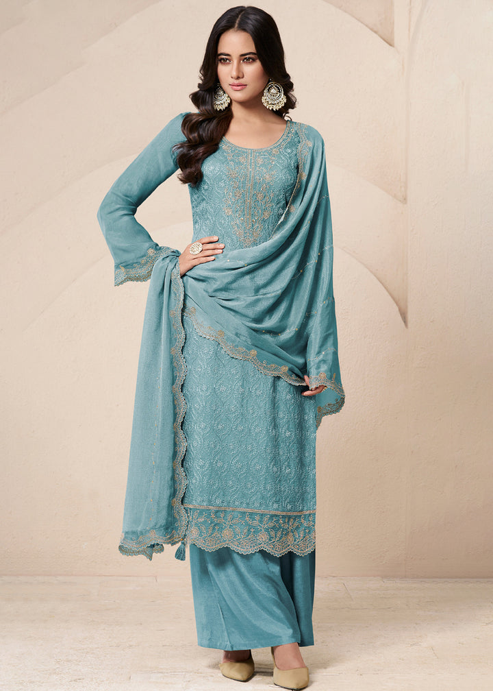 Buy Now Sky Blue Schiffli Embroidered Organza Palazzo Salwar Suit Online in USA, UK, Canada, Germany, Italy, France, Austria & Worldwide at Empress Clothing.
