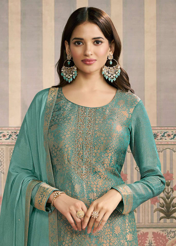 Buy Now Green Shimmer Jacquard Handwork Salwar Suit Online in US, UK, Canada, Germany, Italy, France, Australia, Norway, UAE & Worldwide at Empress Clothing.