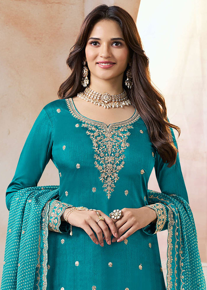 Buy Now Teal Mooga Silk Ethnic Embroidered Sharara Suit Online in USA, UK, Canada, Germany, Italy, France, Austria, Denmark, UAE & Worldwide at Empress.