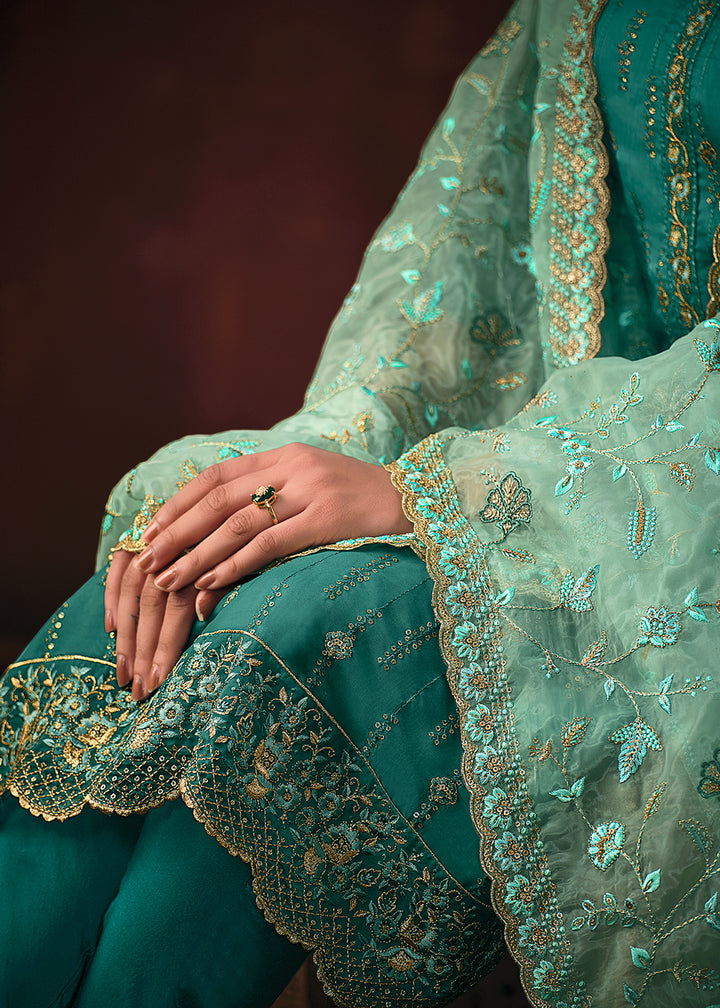 Buy Now Teal Blue Shimmer Organza Embroidered Salwar Suit Online in USA, UK, Canada, Germany, Australia & Worldwide at Empress Clothing. 