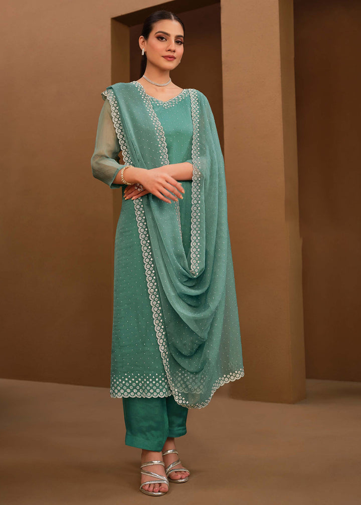 Buy Now Gorgeous Turquoise Swarovski Embellished Festive Salwar Suit Online in USA, UK, Canada, Germany, UAE & Worldwide at Empress Clothing. 