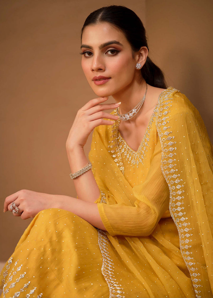 Buy Now Gorgeous Yellow Swarovski Embellished Festive Salwar Suit Online in USA, UK, Canada, Germany, UAE & Worldwide at Empress Clothing. 