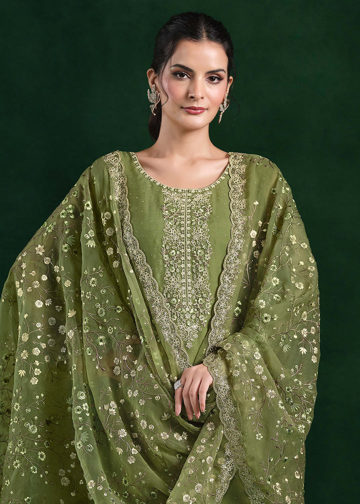 Buy Now Crinkle Chiffon Green Swrovski Work Festive Salwar Suit Online in USA, UK, Canada, Germany, Italy, France, Austria, UAE & Worldwide at Empress Clothing.