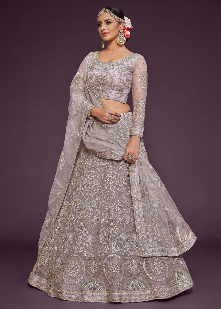 Buy Now Dusky Mauve Embroidered Soft Net Wedding Lehenga Choli Online in USA, UK, Canada & Worldwide at Empress Clothing.