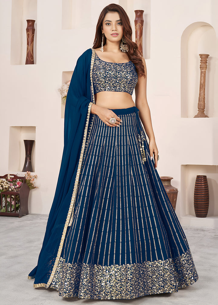 Buy Now Blue Sequins Zari Embroidered Work Function Lehenga Choli Online in US, UK, Canada, France, Italy, Germany, Sweden, UAE &amp; Worldwide at Empress Clothing.
