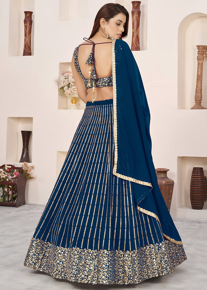 Buy Now Blue Sequins Zari Embroidered Work Function Lehenga Choli Online in US, UK, Canada, France, Italy, Germany, Sweden, UAE &amp; Worldwide at Empress Clothing.