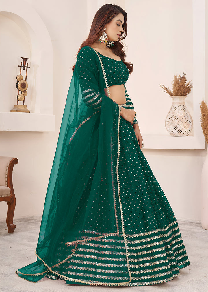 Buy Now Teal Sequin Zari Embroidered Work Function Lehenga Choli Online in US, UK, Canada, France, Italy, Germany, Sweden, UAE &amp; Worldwide at Empress Clothing.