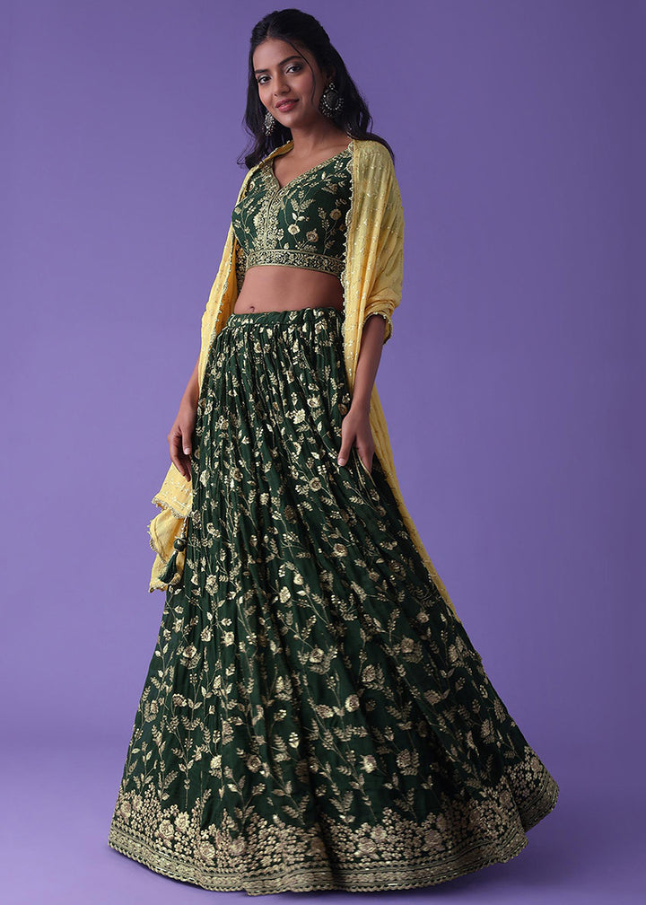 Buy Now Dark Green Festive Style Embroidered Lehenga Choli Online in USA, UK, Canada, France, Italy, Germany, Australia, UAE & Worldwide at Empress Clothing.