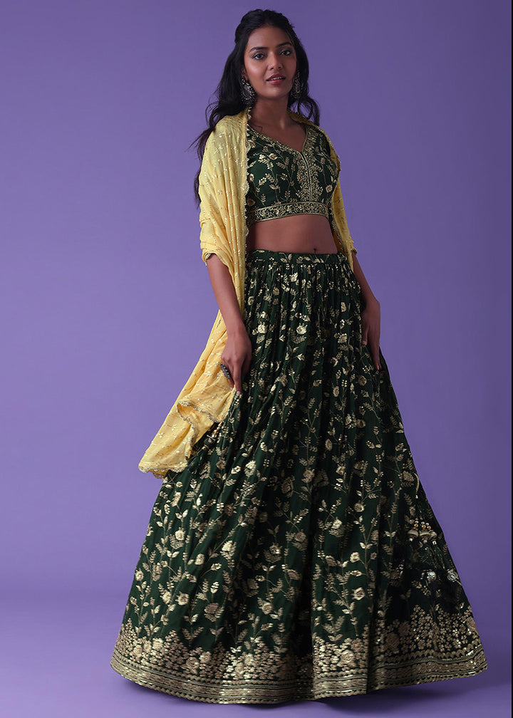 Buy Now Dark Green Festive Style Embroidered Lehenga Choli Online in USA, UK, Canada, France, Italy, Germany, Australia, UAE & Worldwide at Empress Clothing.