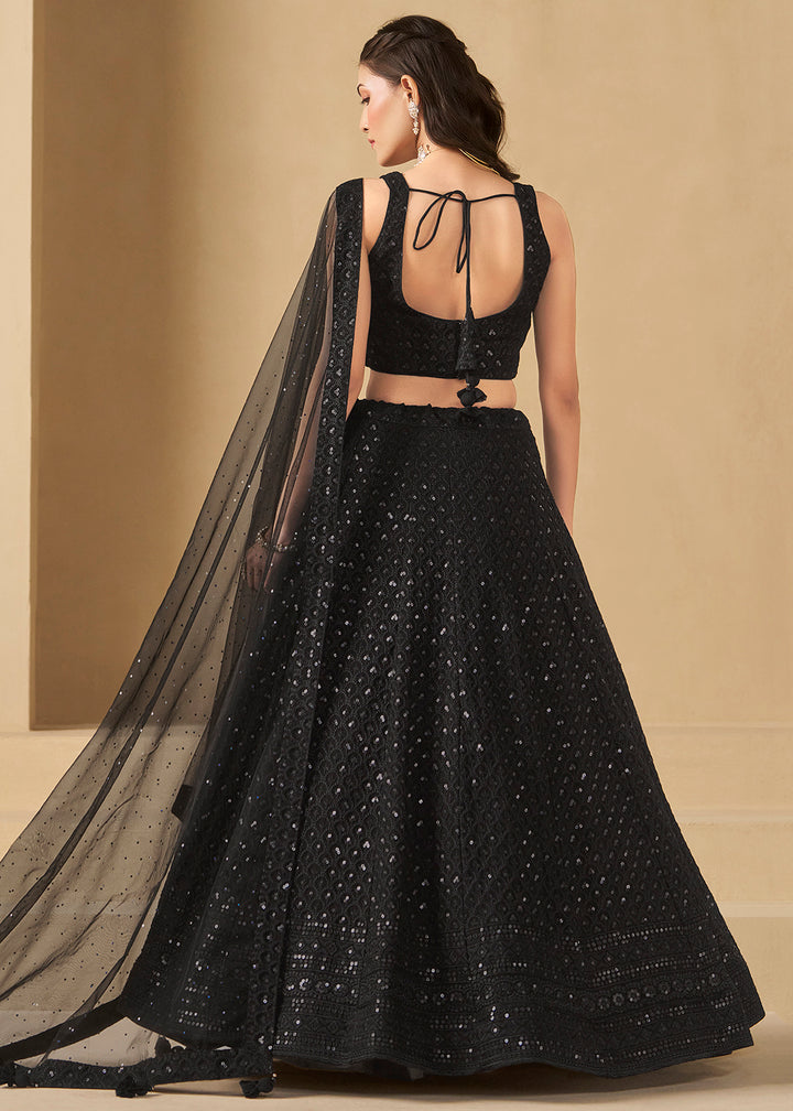 Buy Now Threads & Sequins Work Black Festive Style Lehenga Choli Online in USA, UK, Canada, France, Italy, Germany, Austria, UAE & Worldwide at Empress Clothing.
